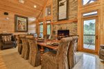 Large dining area with wood-burning fireplace